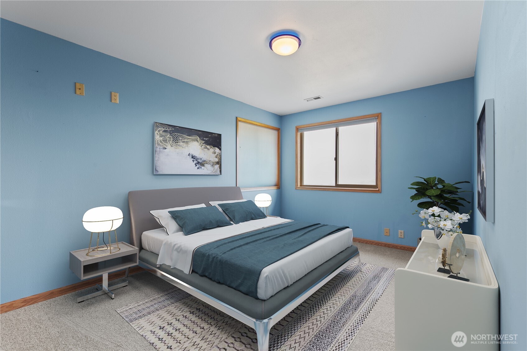 860 Hunt Road Port Angeles, WA 98363 - Photo 20 of 40 a bedroom with a bed and a couch