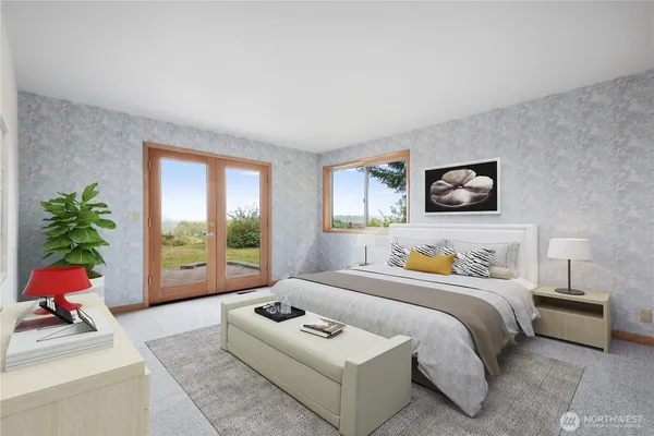 a bedroom with a bed and a couch