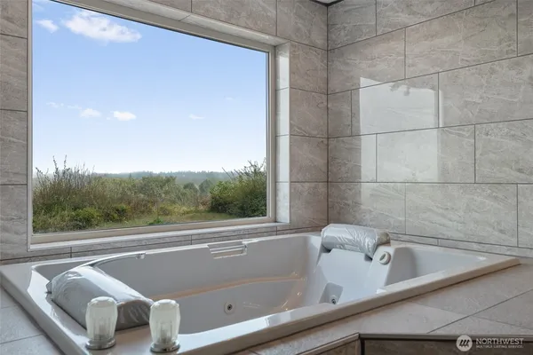 a view of a bathtub in a bathroom