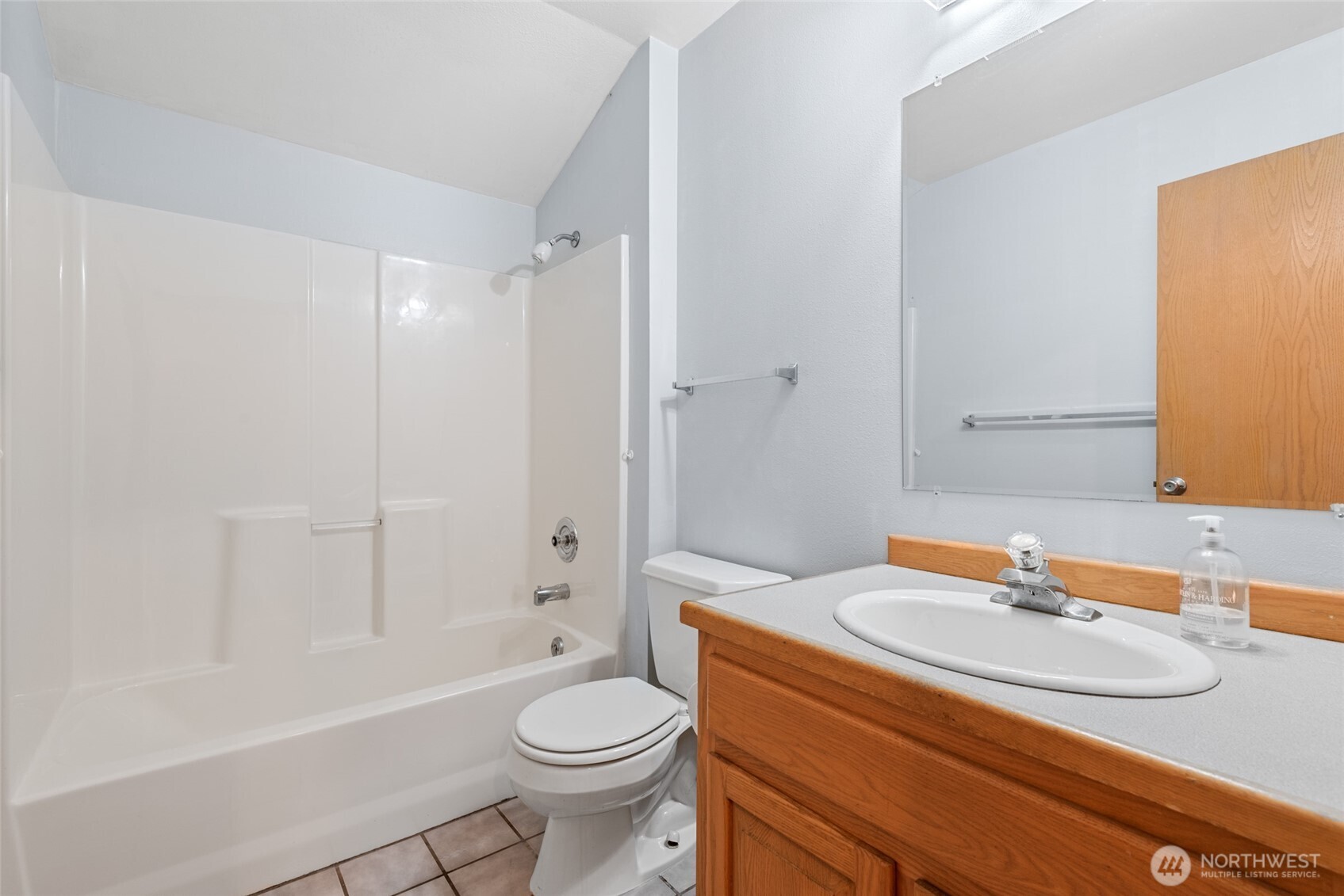 860 Hunt Road Port Angeles, WA 98363 - Photo 30 of 40 a bathroom with a sink a toilet and a mirror
