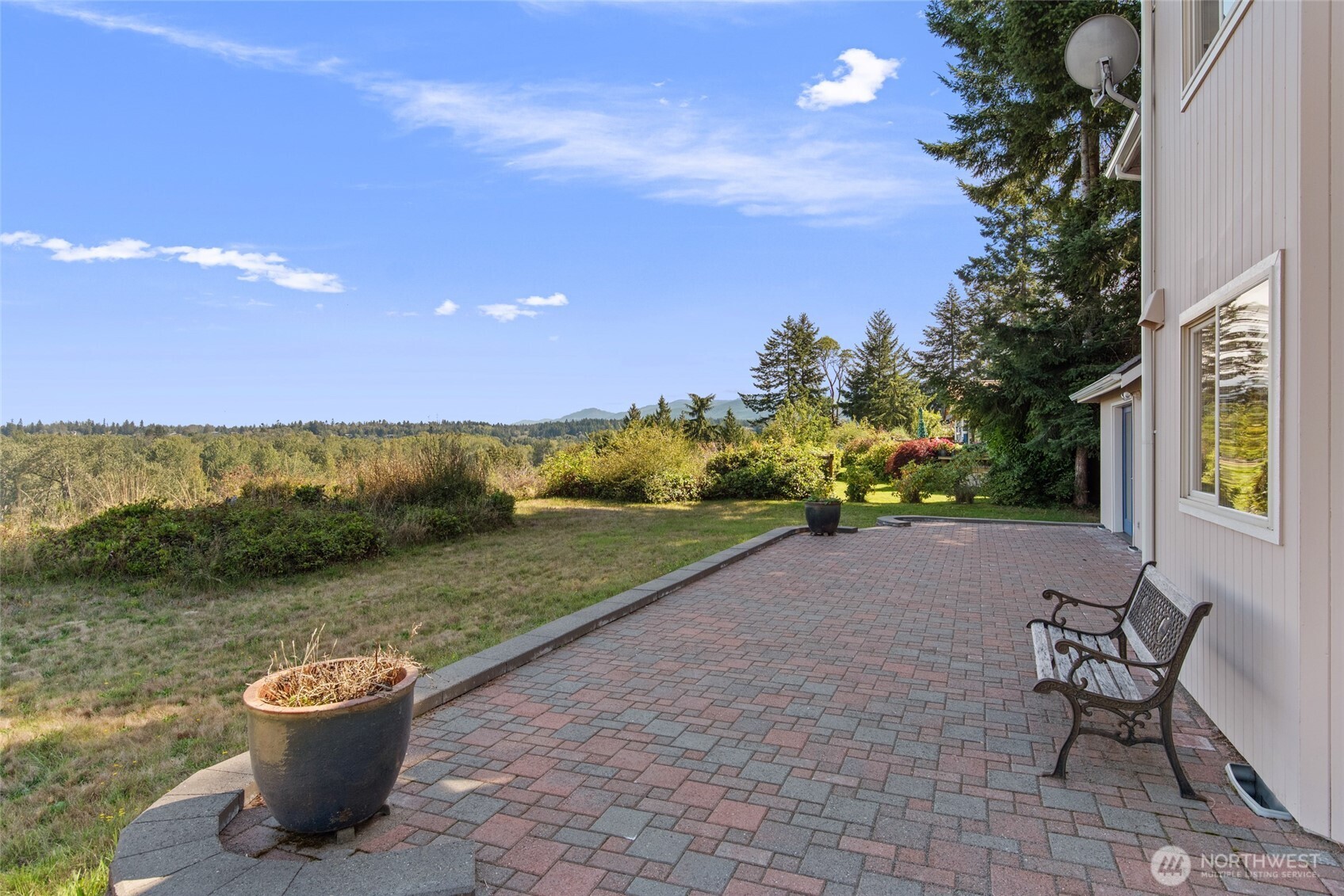 860 Hunt Road Port Angeles, WA 98363 - Photo 37 of 40 a view of a terrace with outdoor seating and a garden