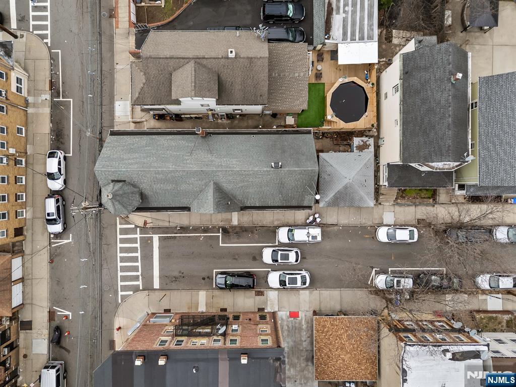 94 Center Street Clifton, NJ 07011 - Photo 3 of 38 an aerial view of residential houses with outdoor space