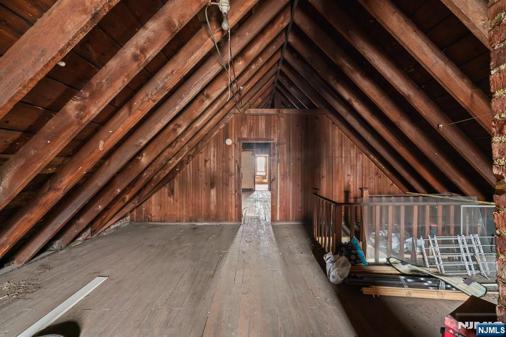 94 Center Street Clifton, NJ 07011 - Photo 34 of 38 a view of deck with wooden floor and fence and a floor to ceiling window