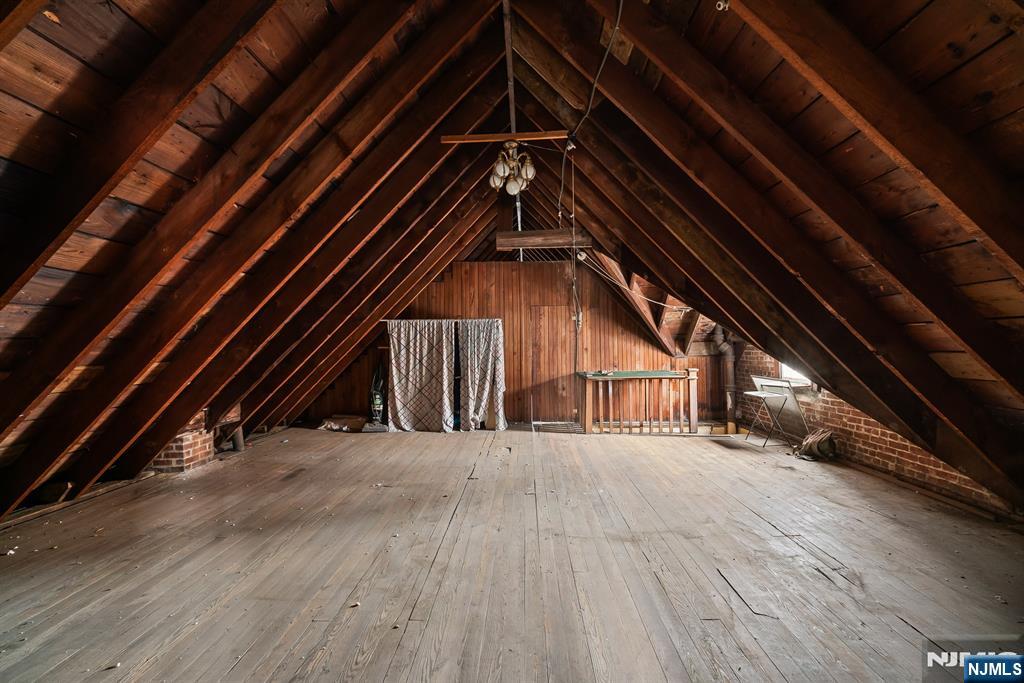 94 Center Street Clifton, NJ 07011 - Photo 38 of 38 a view of wooden floor in an empty room