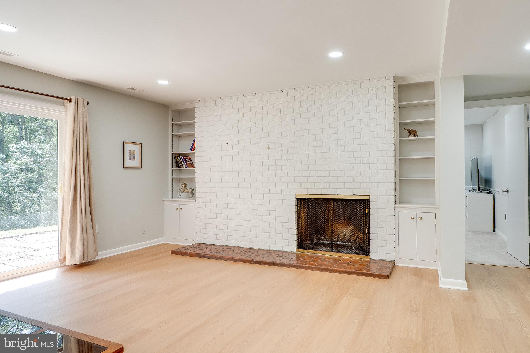 10236 Lawyers Road Vienna, VA 22181 - Photo 31 of 47 New flooring in Rec Room