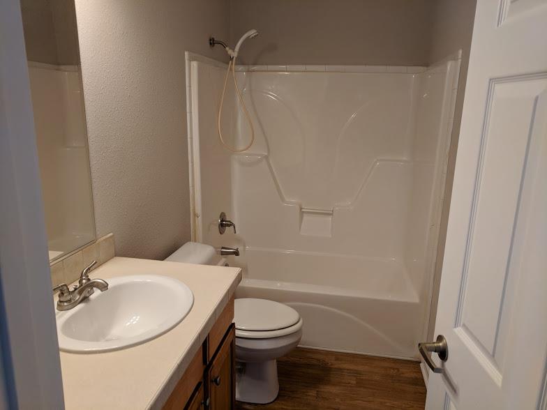263 Elora Road Elora, TN 37328 - Photo 13 of 16 a bathroom with a sink a toilet and shower
