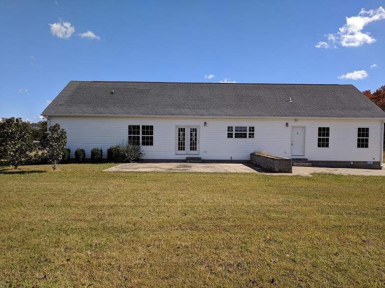 263 Elora Road Elora, TN 37328 - Photo 15 of 16 a swimming pool with outdoor seating and yard