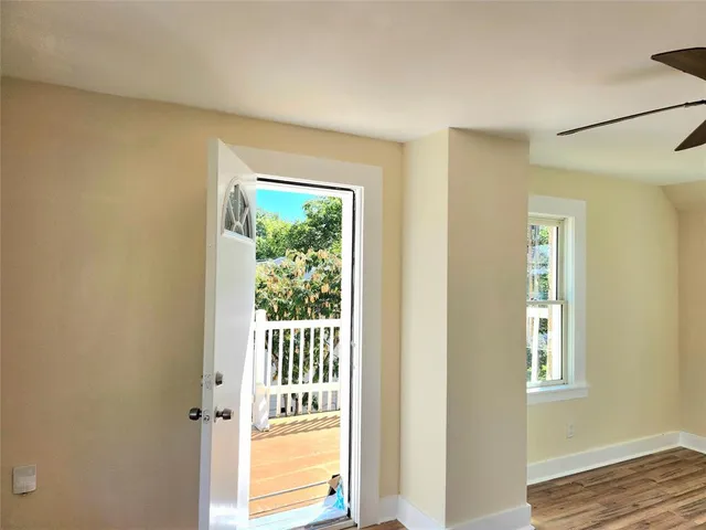 a view of a bedroom from a hallway