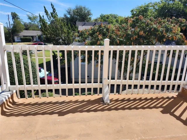 a view of a wooden park bench