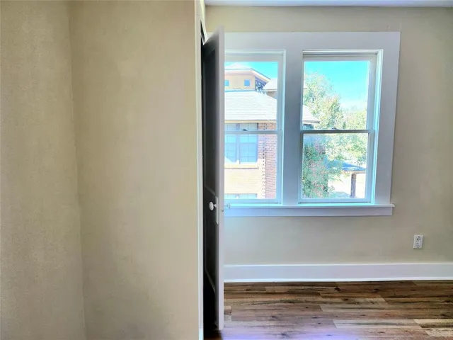a view of a room that has a window in it