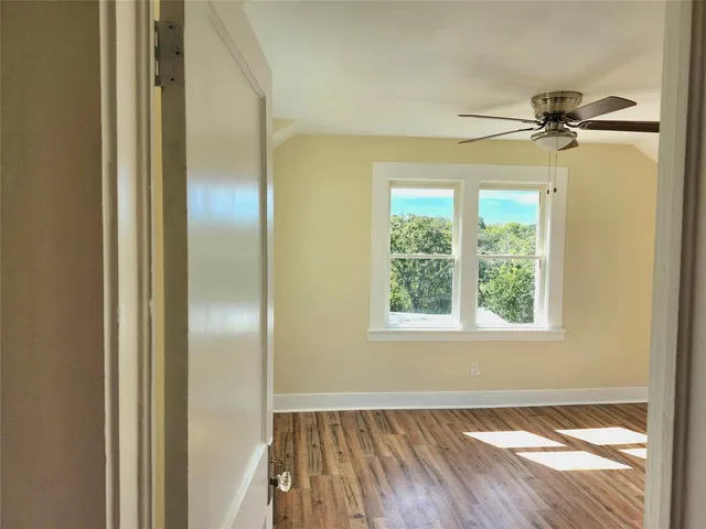 a view of an empty room and window
