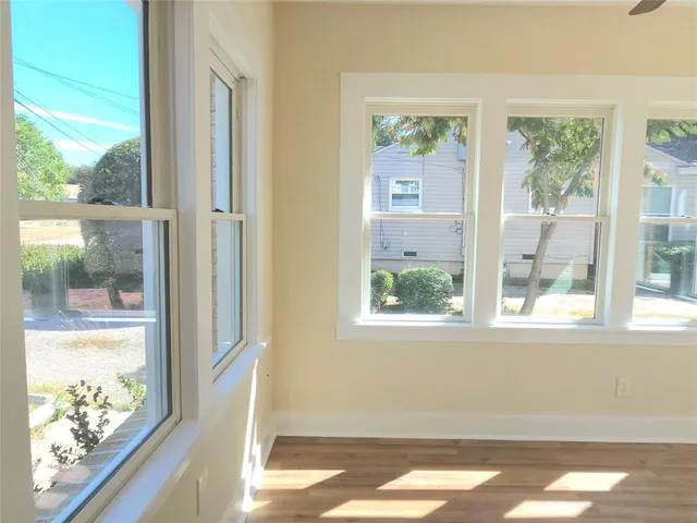 a view of a room that has a window in it