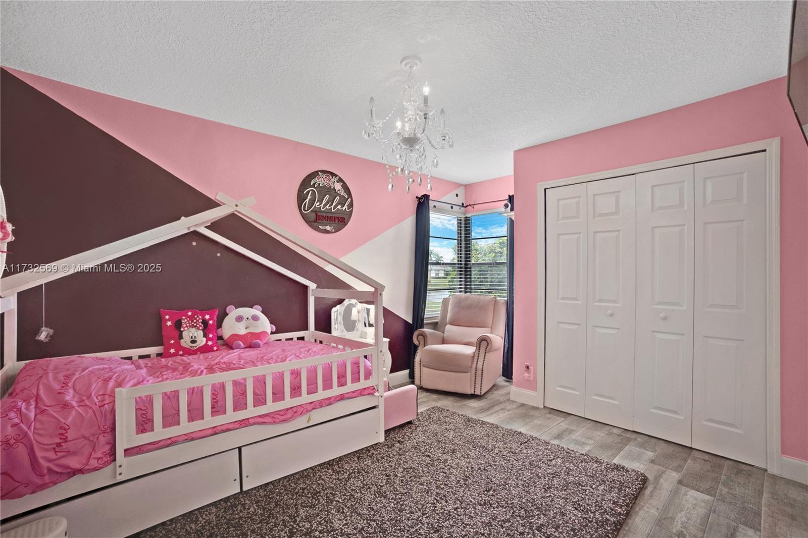 9635 Triton Court Boca Raton, FL 33434 - Photo 11 of 18 a bedroom with a bed and a window