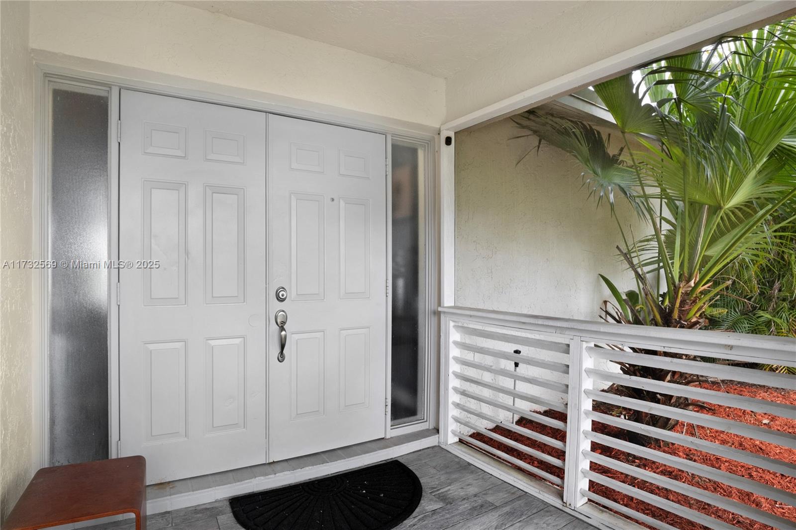 9635 Triton Court Boca Raton, FL 33434 - Photo 3 of 18 a view of a closet area with staircase