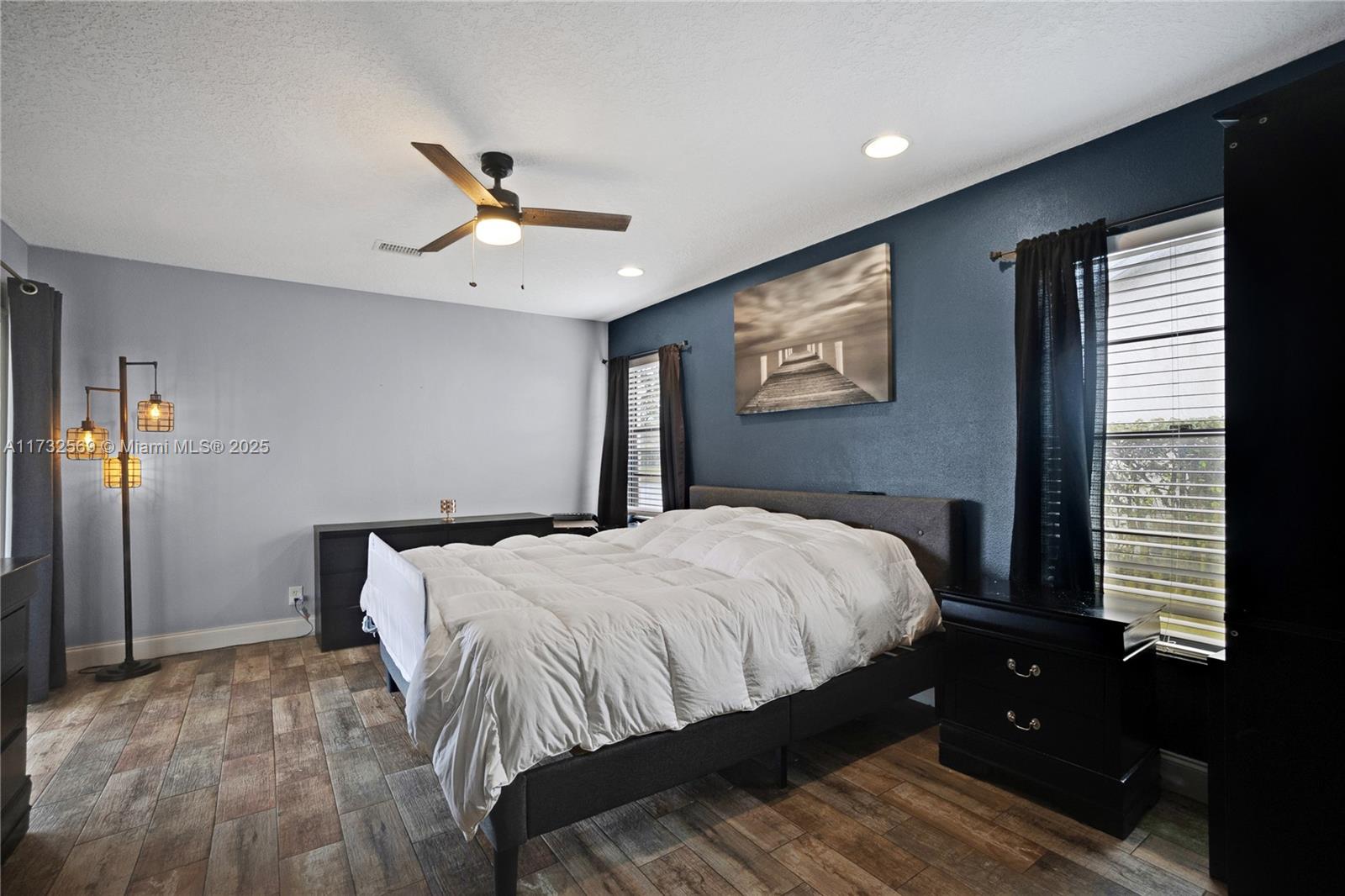 9635 Triton Court Boca Raton, FL 33434 - Photo 9 of 18 a bedroom with a bed and a window