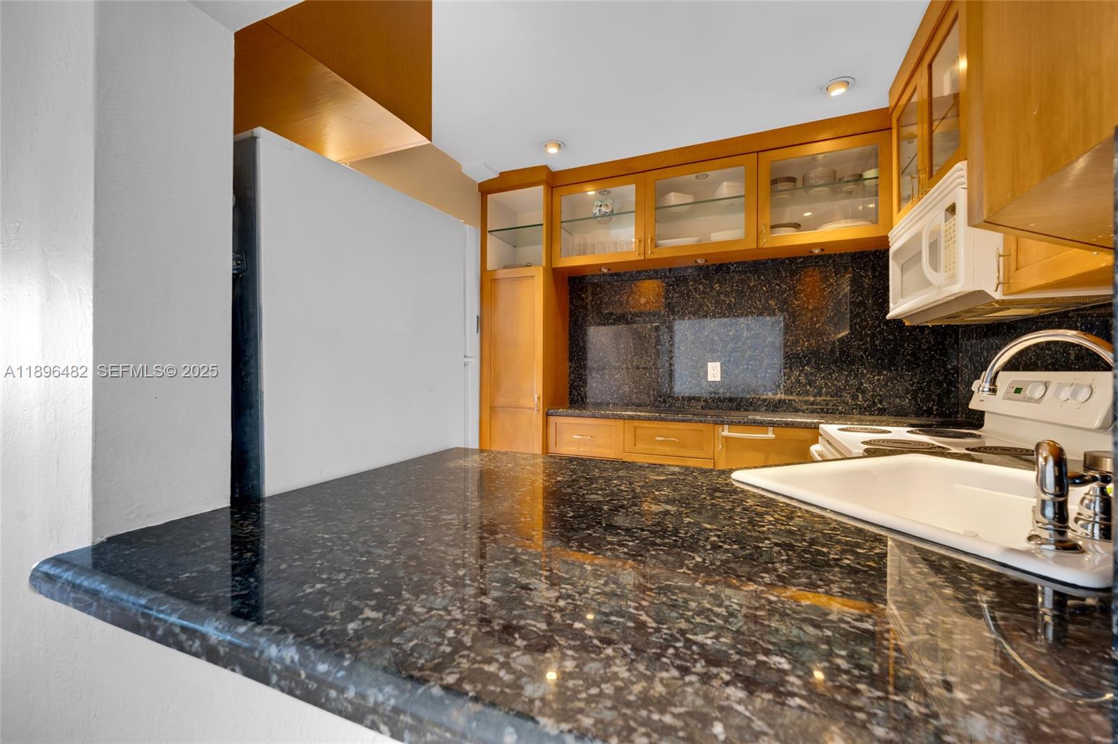 6545 Indian Creek Drive, Unit 504 Miami Beach, FL 33141 - Photo 12 of 38 a view of a living room with a sink
