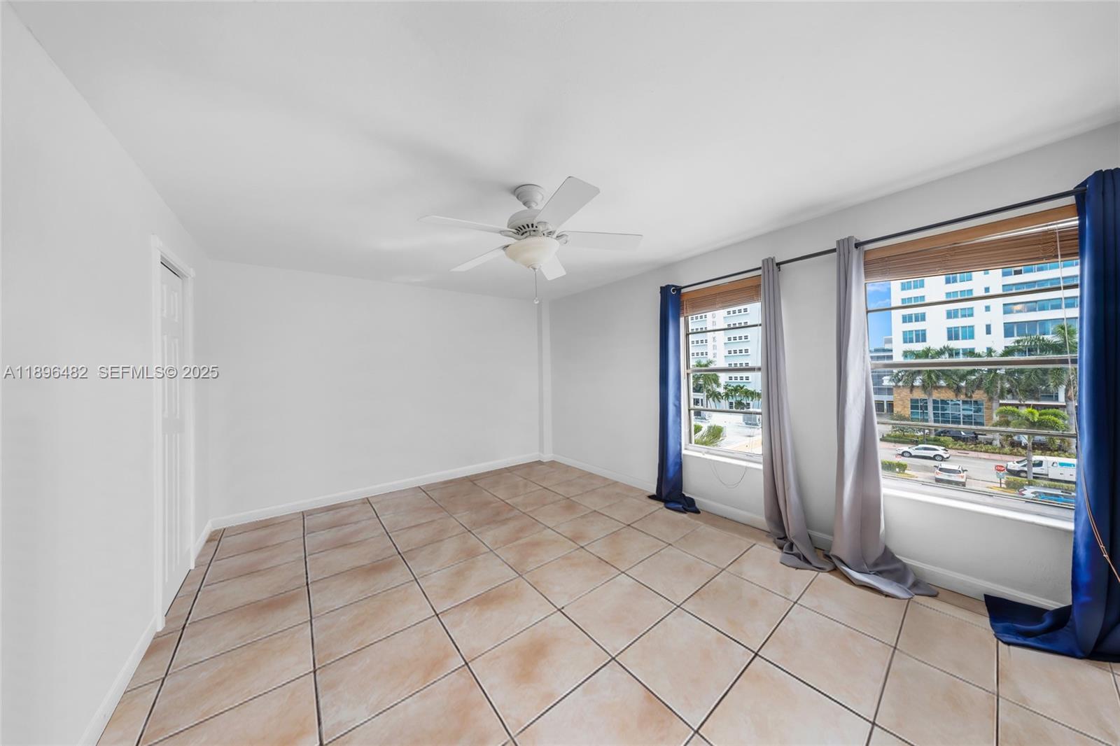 6545 Indian Creek Drive, Unit 504 Miami Beach, FL 33141 - Photo 14 of 38 a view of an empty room with a window
