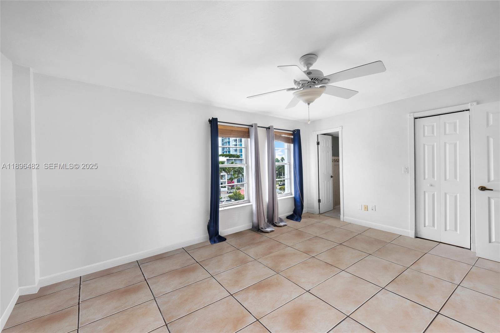 6545 Indian Creek Drive, Unit 504 Miami Beach, FL 33141 - Photo 17 of 38 a view of an empty room with a window