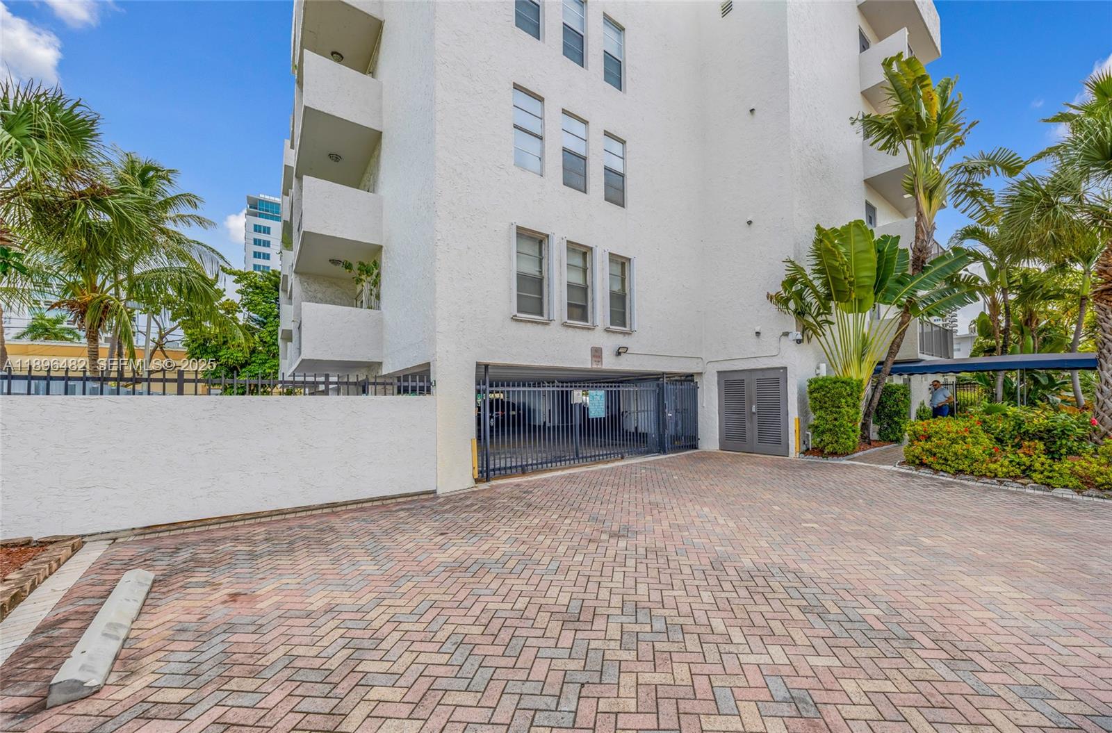 6545 Indian Creek Drive, Unit 504 Miami Beach, FL 33141 - Photo 23 of 38 a view of a building with a yard