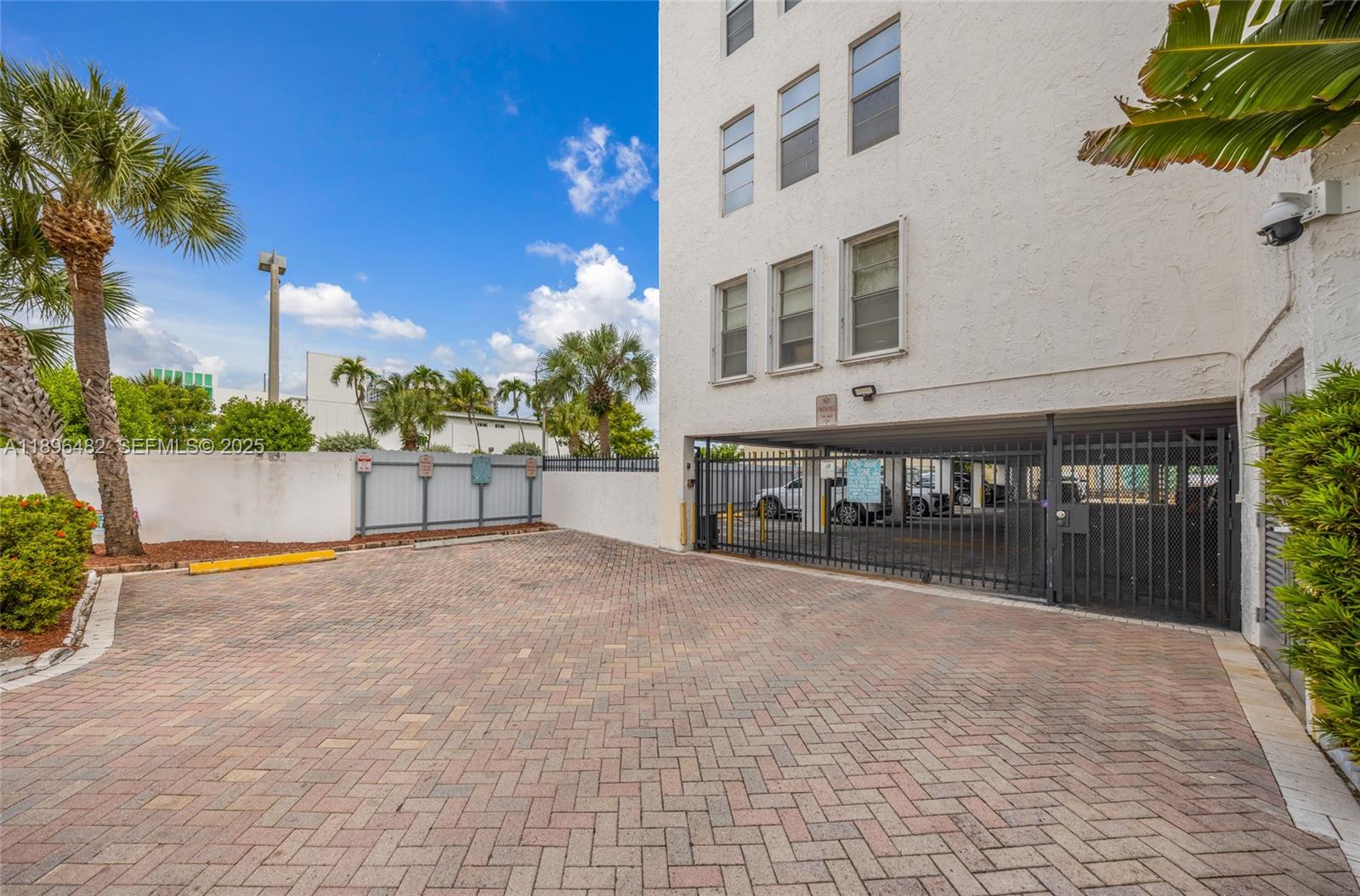 6545 Indian Creek Drive, Unit 504 Miami Beach, FL 33141 - Photo 24 of 38 a view of a house with backyard and sitting area