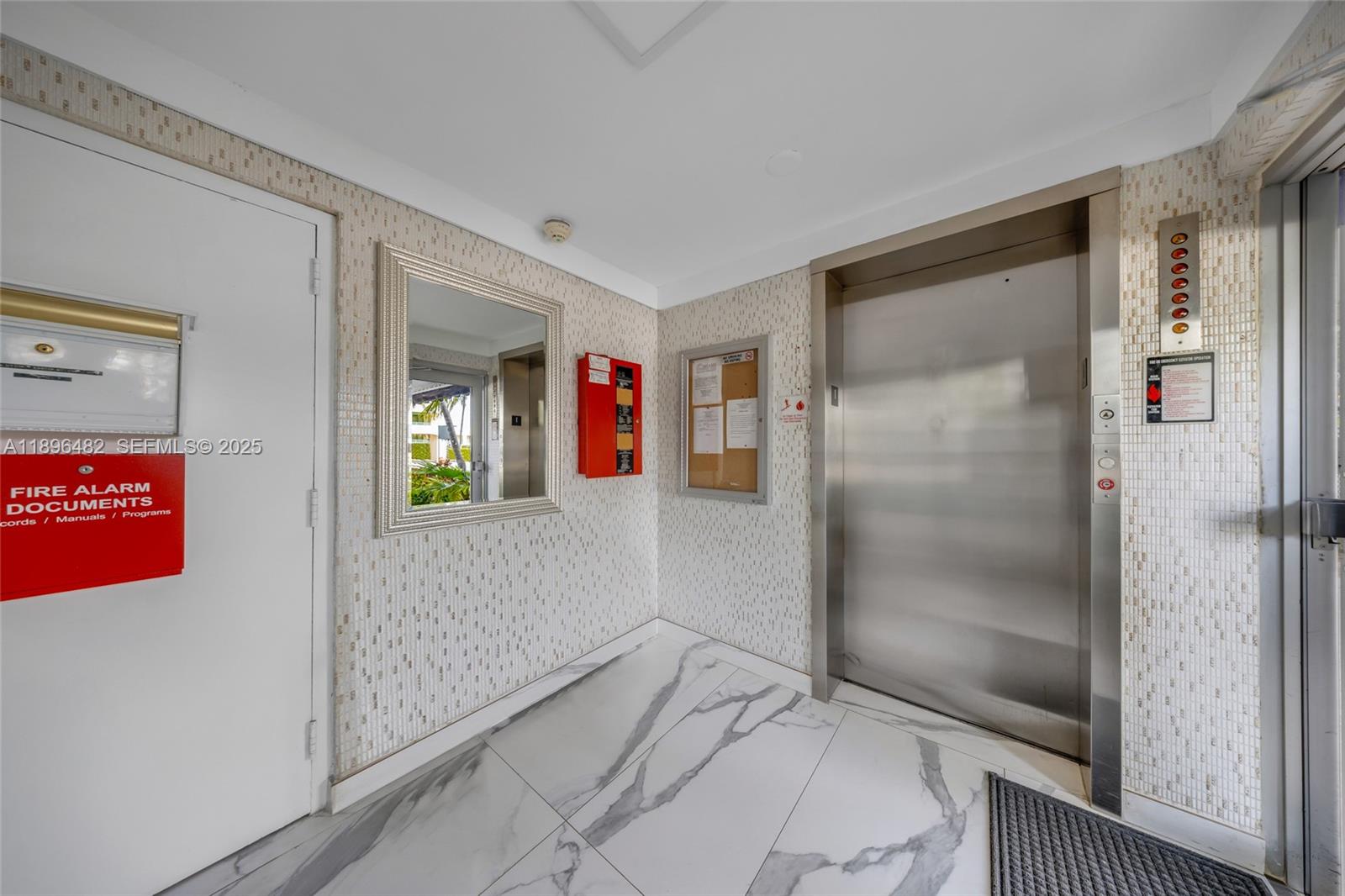 6545 Indian Creek Drive, Unit 504 Miami Beach, FL 33141 - Photo 27 of 38 a en suite bathroom with a shower