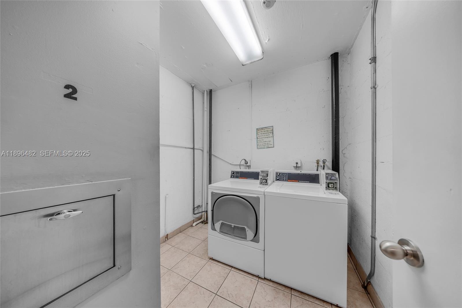6545 Indian Creek Drive, Unit 504 Miami Beach, FL 33141 - Photo 29 of 38 a view of a kitchen with sink washer and dryer