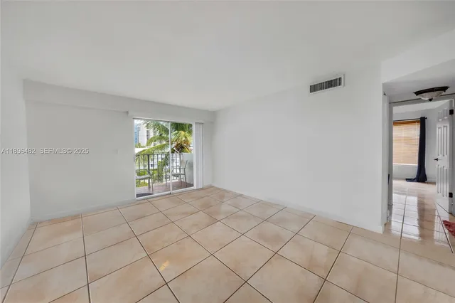 a bathroom with a sink a bathtub and window
