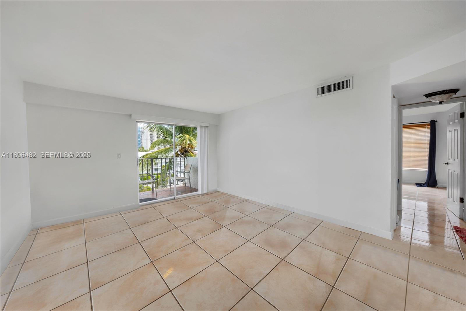 6545 Indian Creek Drive, Unit 504 Miami Beach, FL 33141 - Photo 30 of 38 a view of an empty room and window