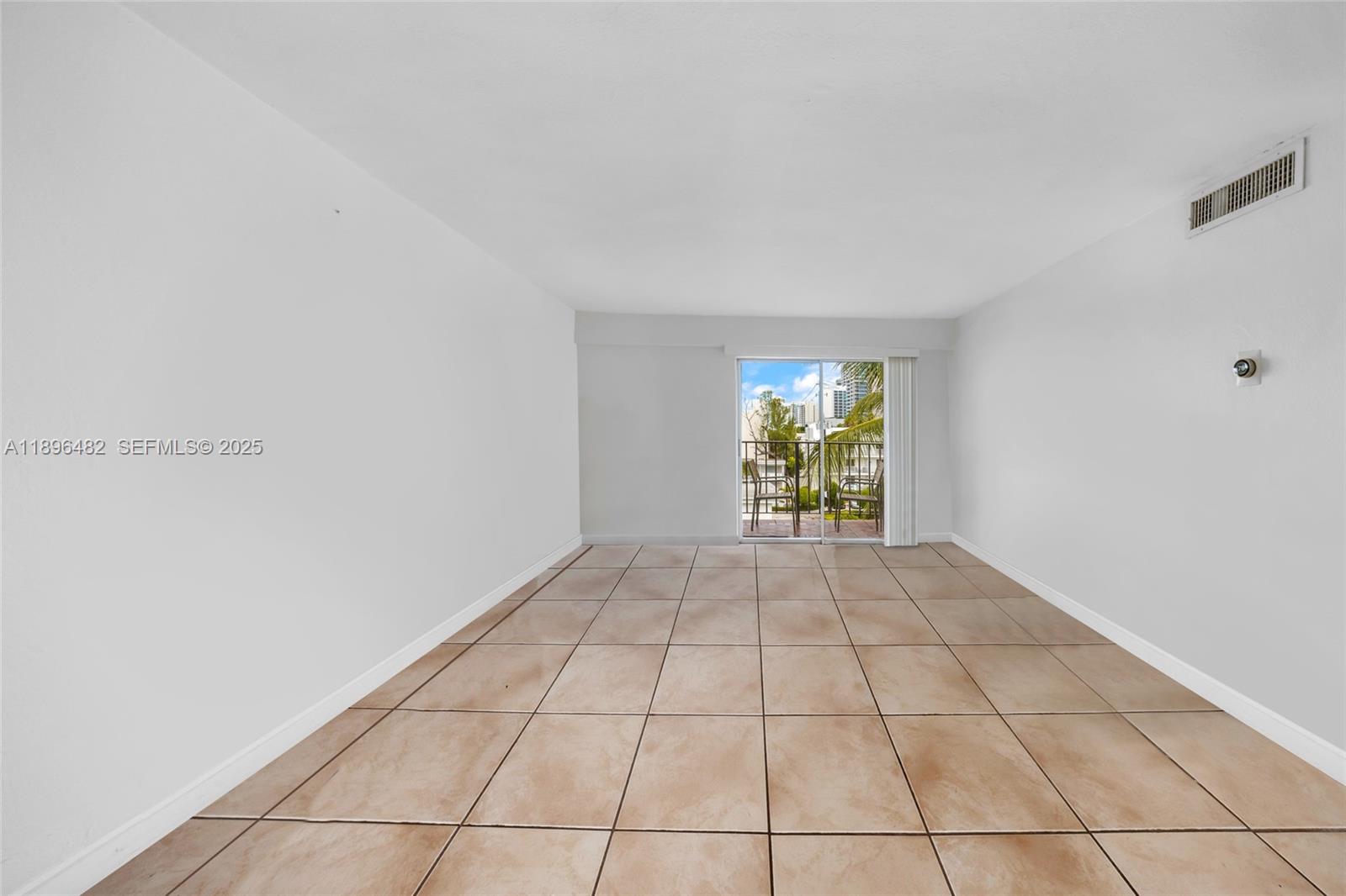 6545 Indian Creek Drive, Unit 504 Miami Beach, FL 33141 - Photo 31 of 38 a view of an empty room and window