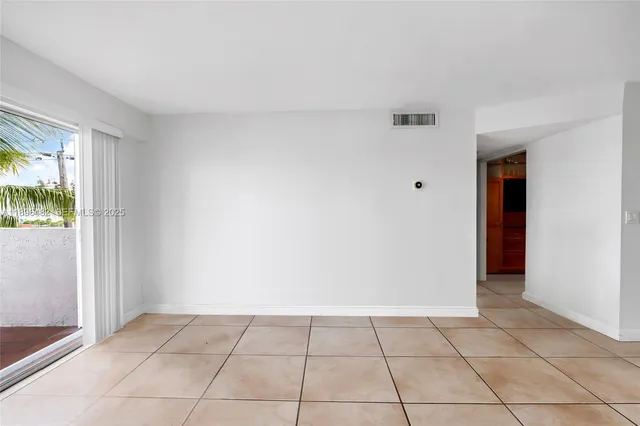 an empty room with window