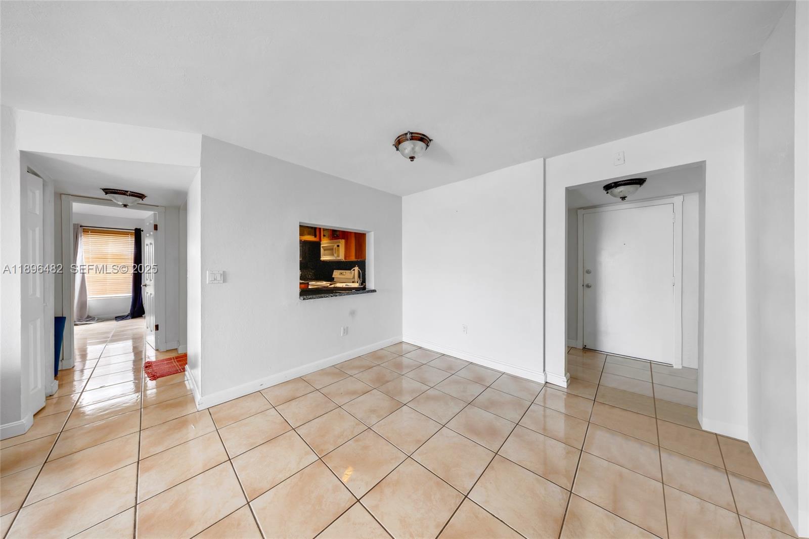 6545 Indian Creek Drive, Unit 504 Miami Beach, FL 33141 - Photo 9 of 38 a view of an empty room and window