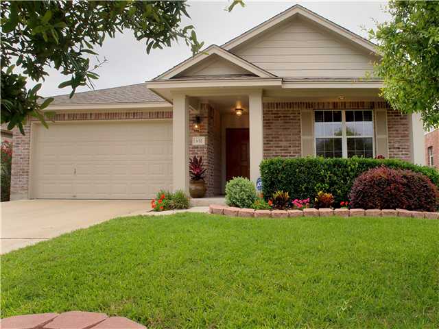632 Rusk Road Round Rock, TX 78665 - Photo 1 of 1 a front view of a house with a yard