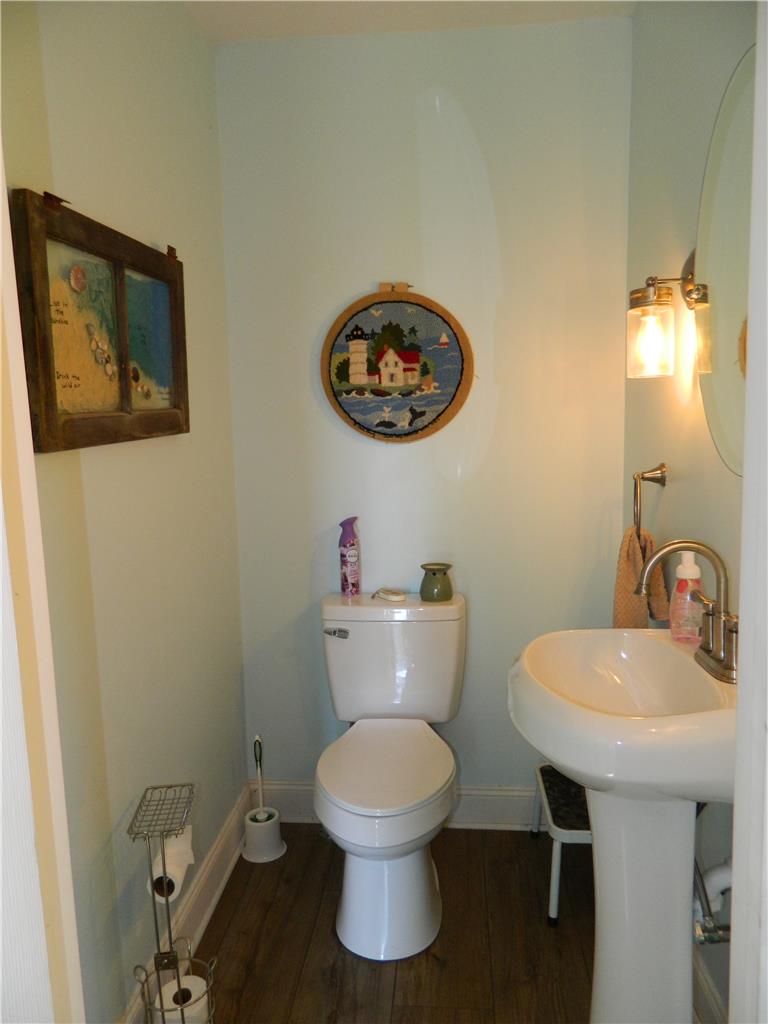 2130 Huntington Street Bethlehem, PA 18017 - Photo 13 of 23 A well-appointed powder room features rich hardwood flooring and stylish fixtures.