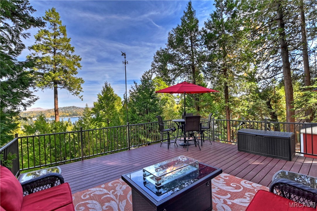 329 Summit Road Lake Arrowhead, CA 92352 - Photo 33 of 50 an outdoor sitting area with furniture and wooden deck