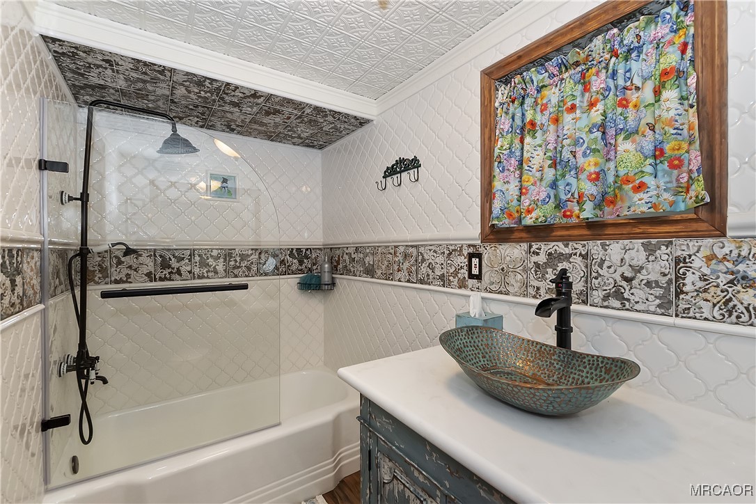 329 Summit Road Lake Arrowhead, CA 92352 - Photo 42 of 50 a bathroom with a sink and a mirror