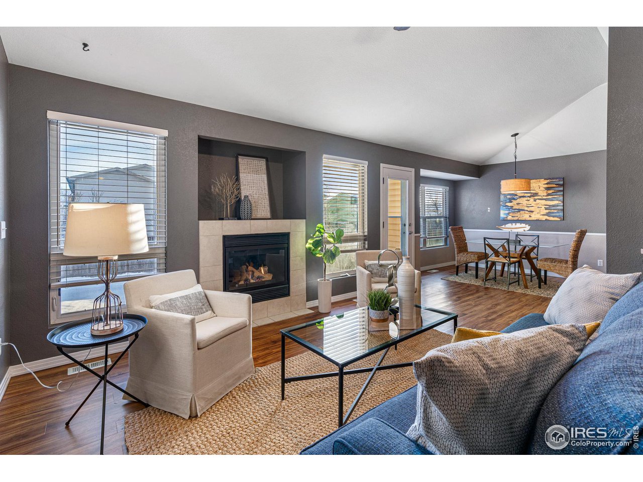 628 Sumac Street Frederick, CO 80530 - Photo 1 of 38 a living room with furniture and a fireplace