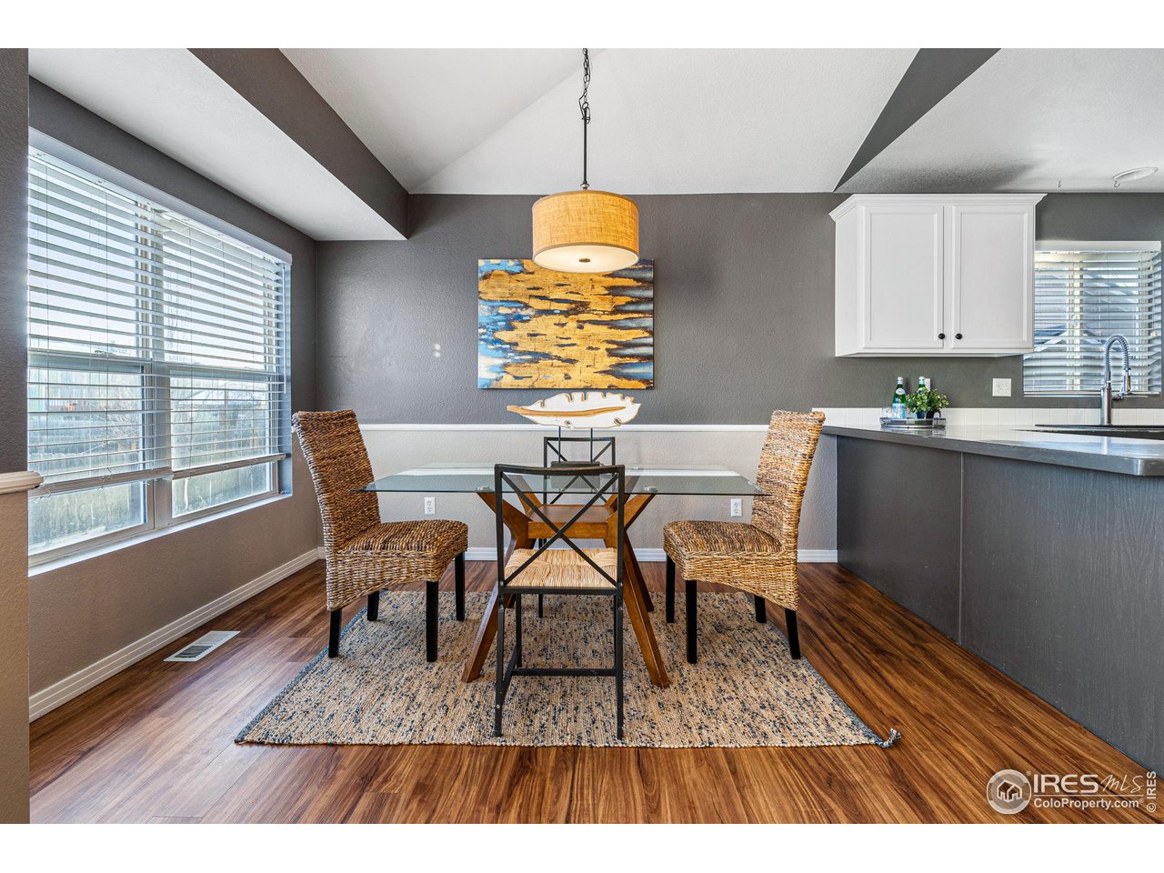 628 Sumac Street Frederick, CO 80530 - Photo 12 of 38 a view of a dining room with furniture and window