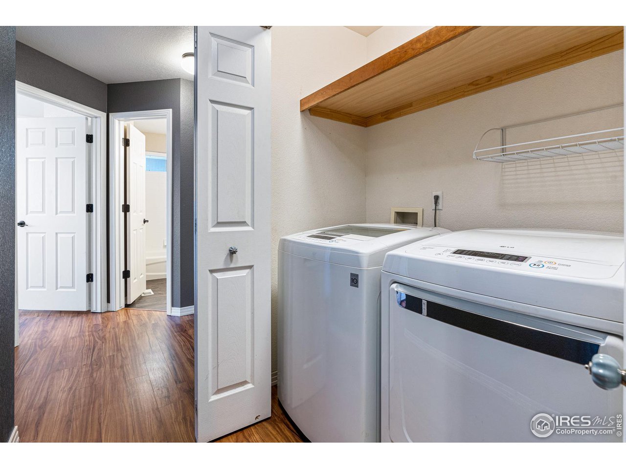 628 Sumac Street Frederick, CO 80530 - Photo 30 of 38 a utility room with dryer and washer