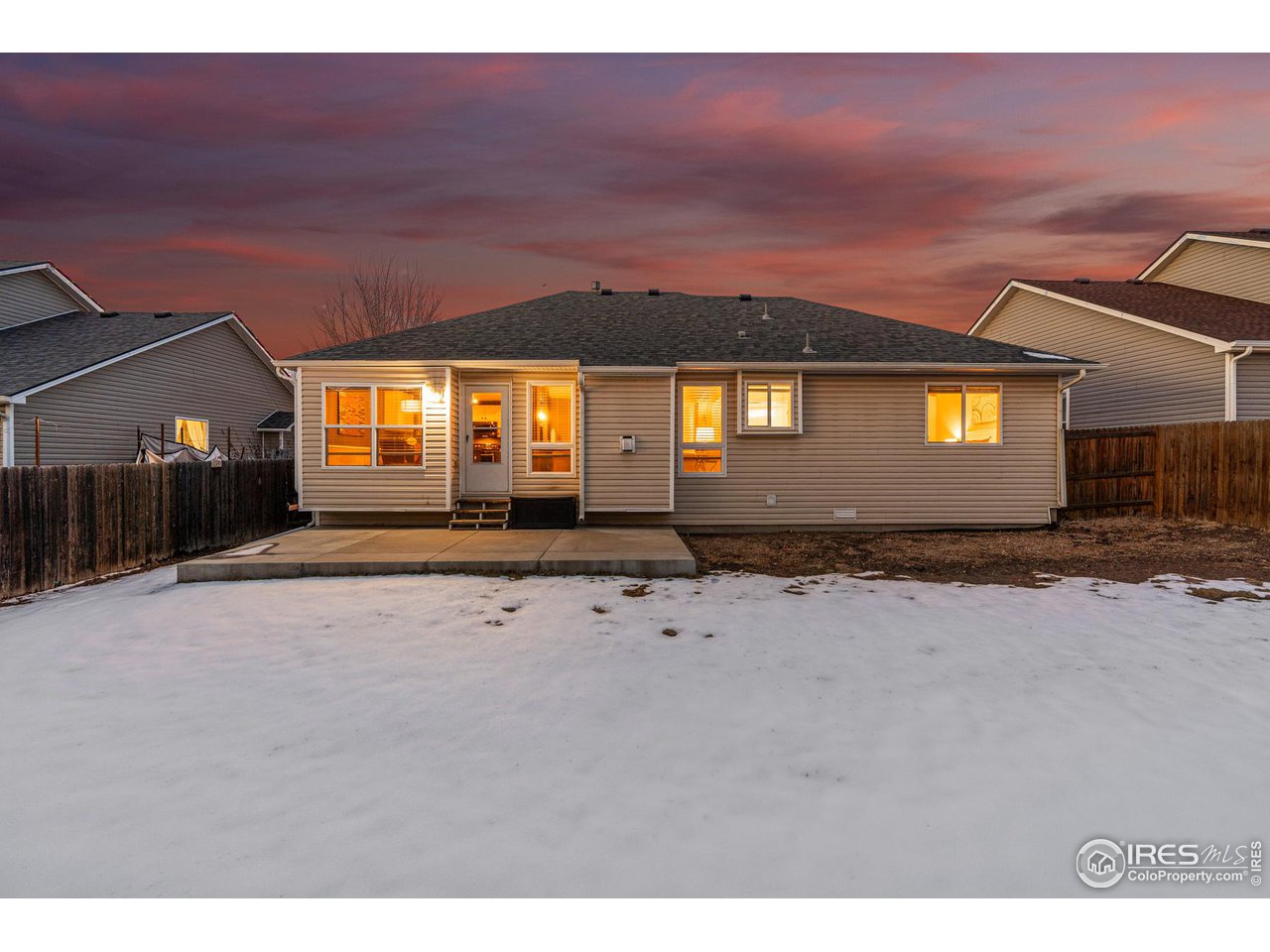 628 Sumac Street Frederick, CO 80530 - Photo 32 of 38 a view of a house with a yard