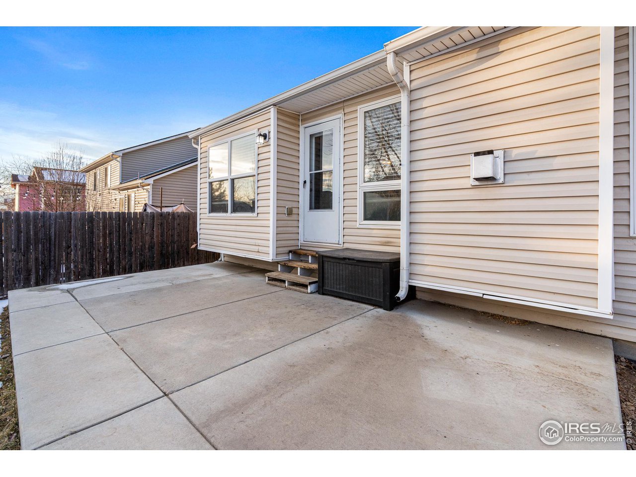 628 Sumac Street Frederick, CO 80530 - Photo 35 of 38 a view of a house with a backyard