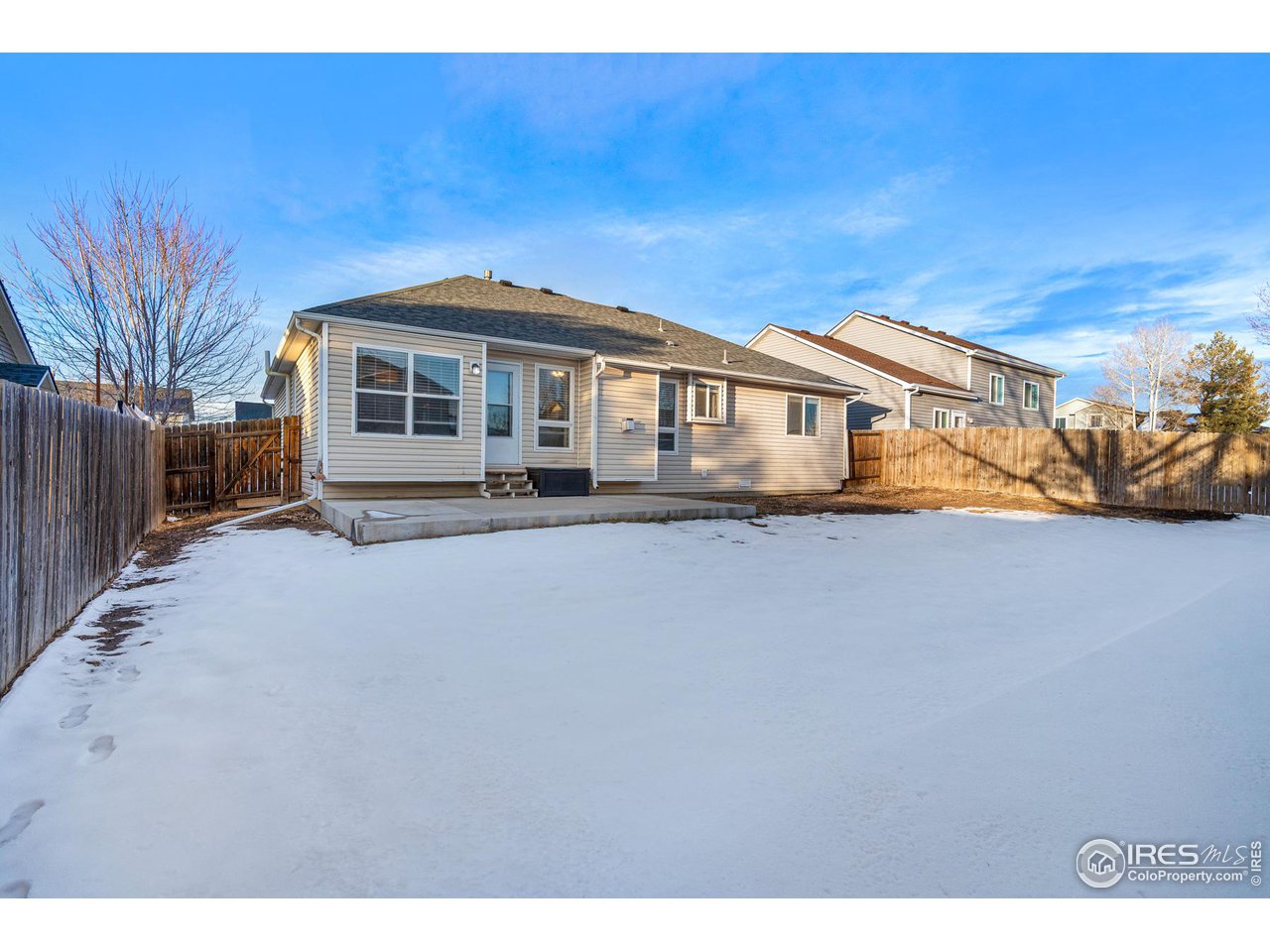 628 Sumac Street Frederick, CO 80530 - Photo 36 of 38 a front view of a house with a yard