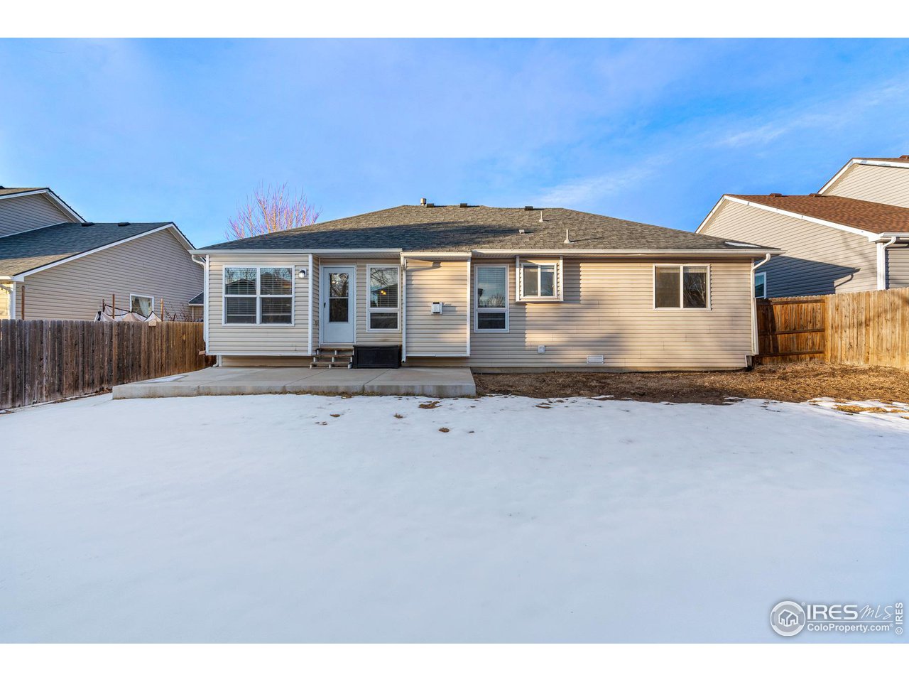 628 Sumac Street Frederick, CO 80530 - Photo 37 of 38 a front view of a house with yard