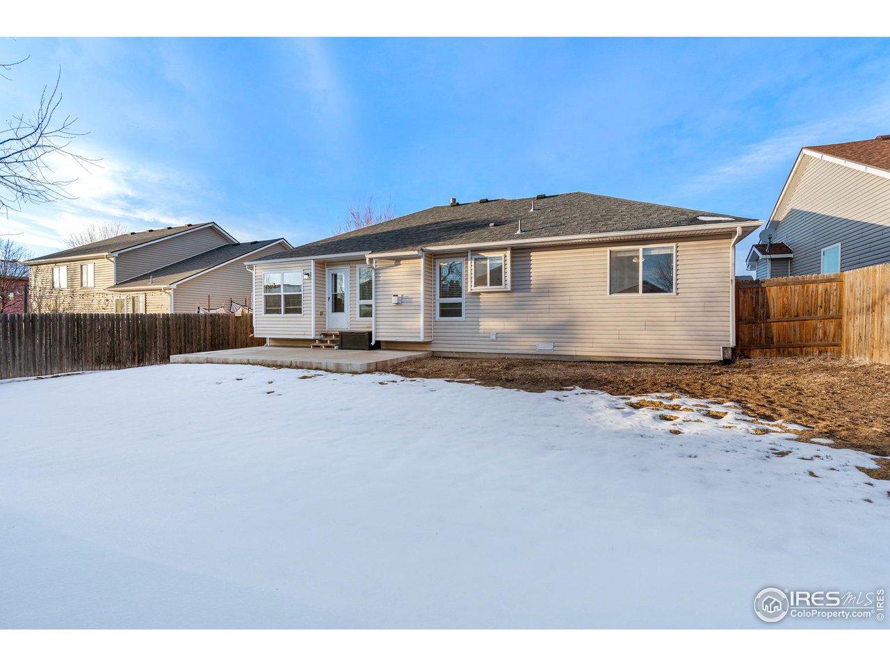 628 Sumac Street Frederick, CO 80530 - Photo 38 of 38 a front view of a house with a yard
