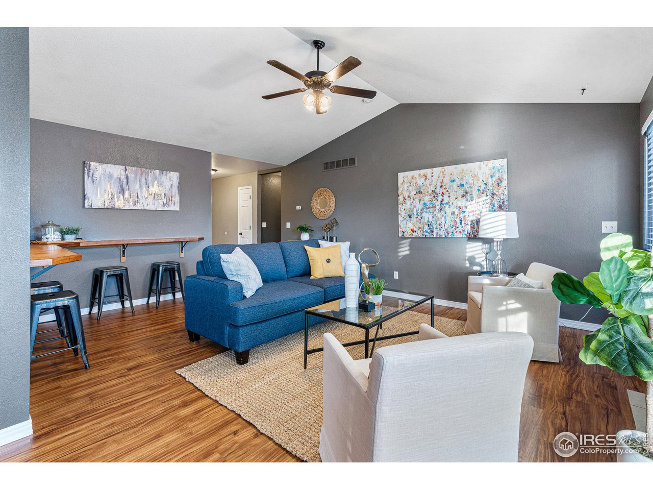 628 Sumac Street Frederick, CO 80530 - Photo 9 of 38 a living room with furniture and window