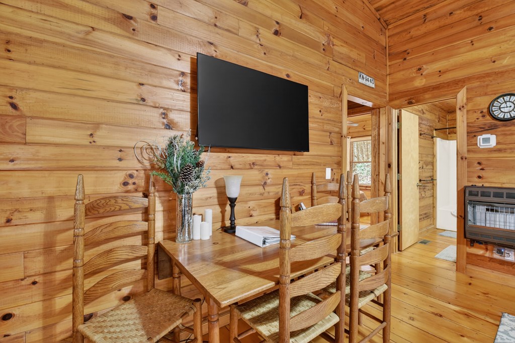 488 Joann Sisson Road Blue Ridge, GA 30513 - Photo 18 of 39 a flat screen tv on the wall of a building