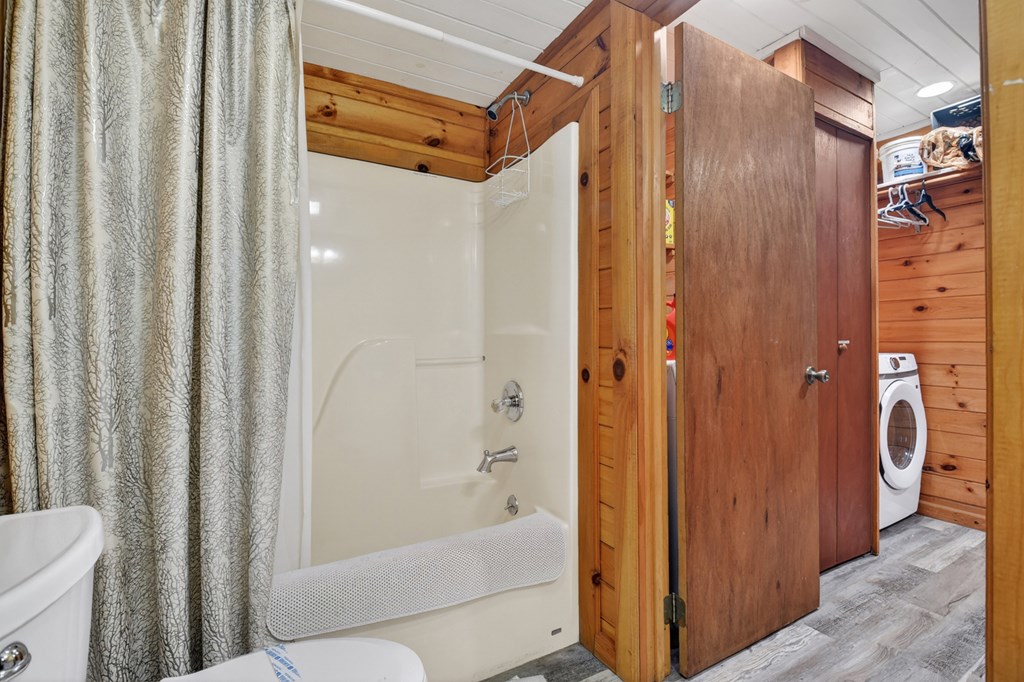 488 Joann Sisson Road Blue Ridge, GA 30513 - Photo 35 of 39 a bathroom with a shower and a tub