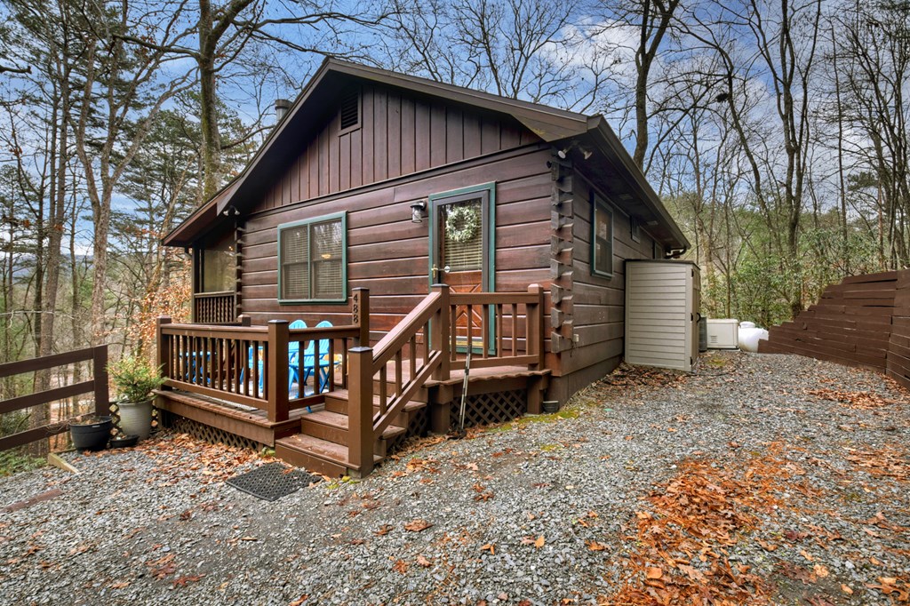 488 Joann Sisson Road Blue Ridge, GA 30513 - Photo 8 of 39 a view of backyard with deck and wooden floor