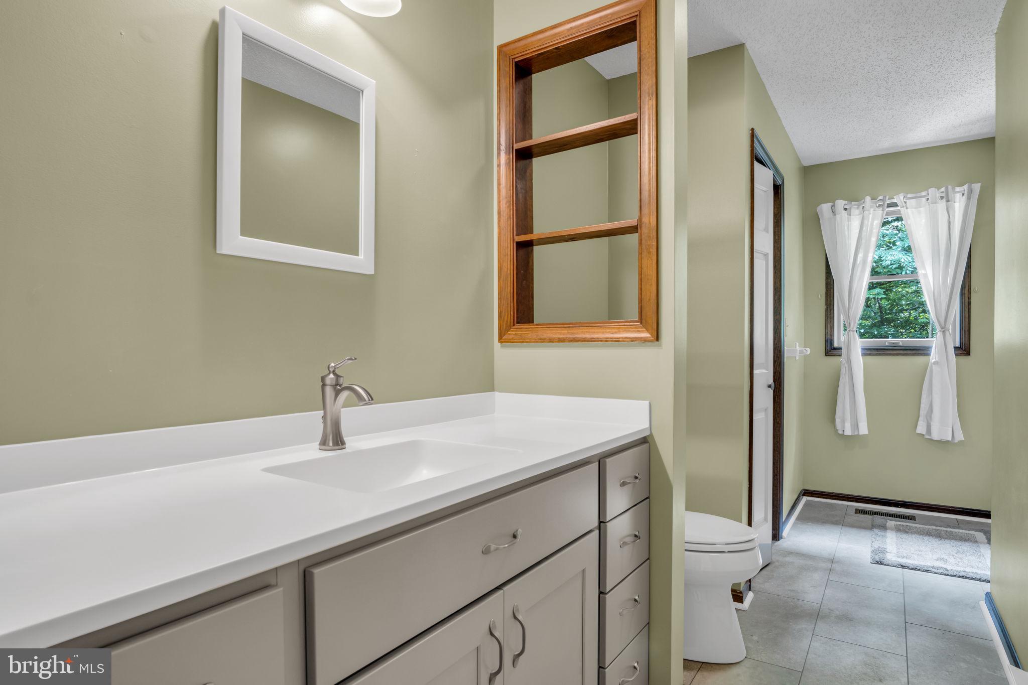350 Poplar Road Dillsburg, PA 17019 - Photo 22 of 44 Serene bathroom with natural light.