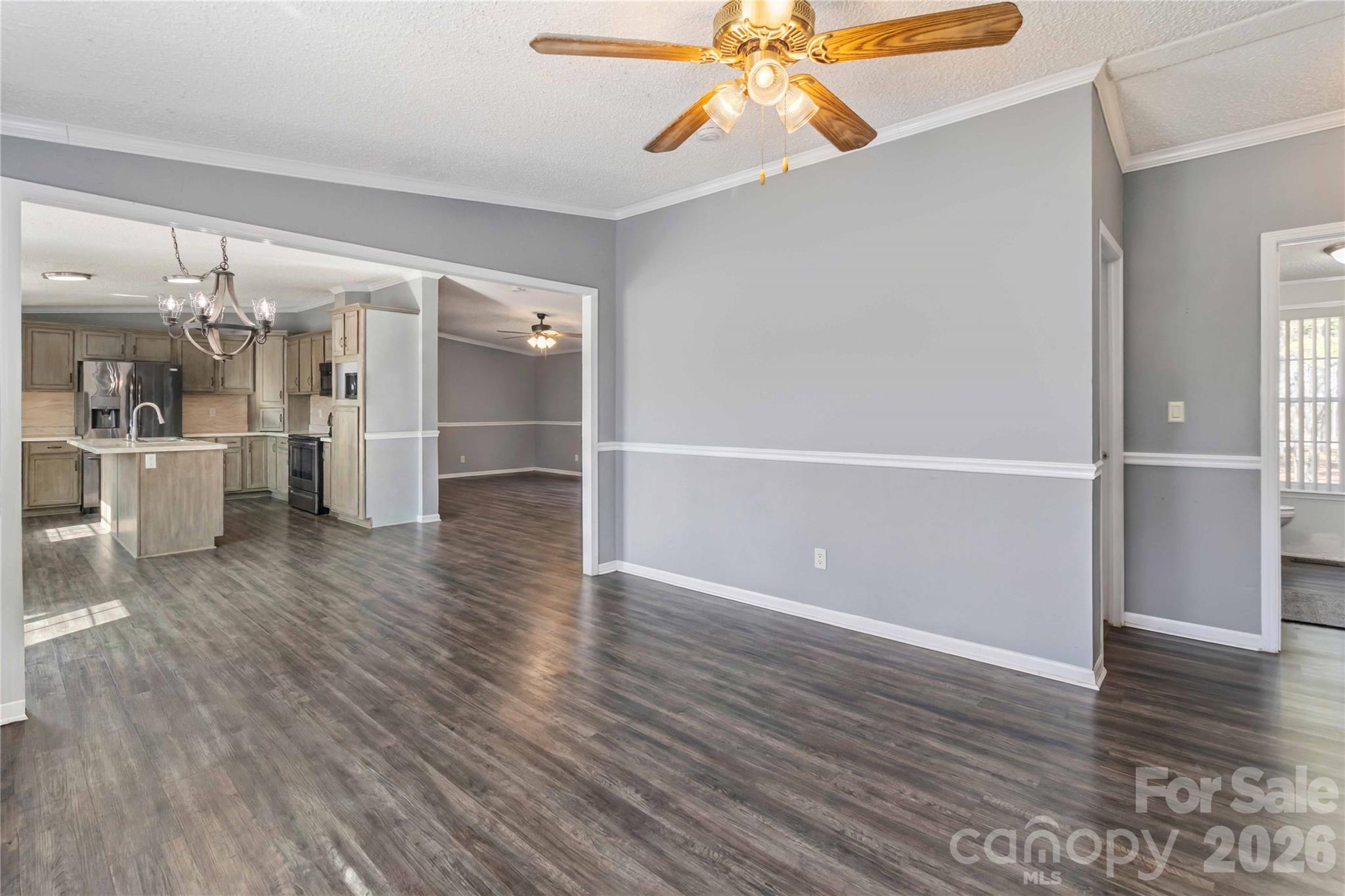 482 Pine Road Jefferson, SC 29718 - Photo 19 of 39 wooden floor in an empty room with a window