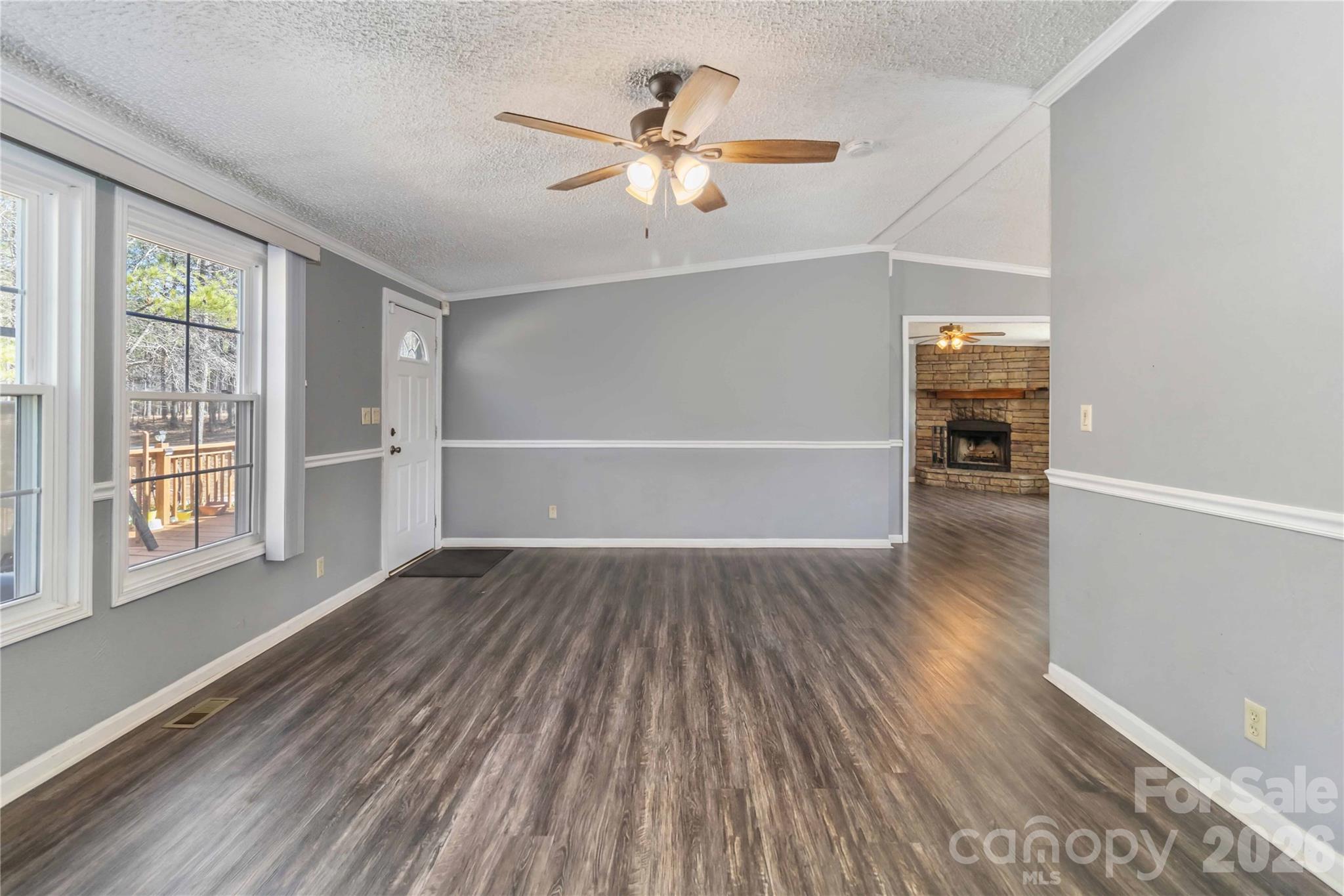 482 Pine Road Jefferson, SC 29718 - Photo 6 of 39 wooden floor in an empty room with a window